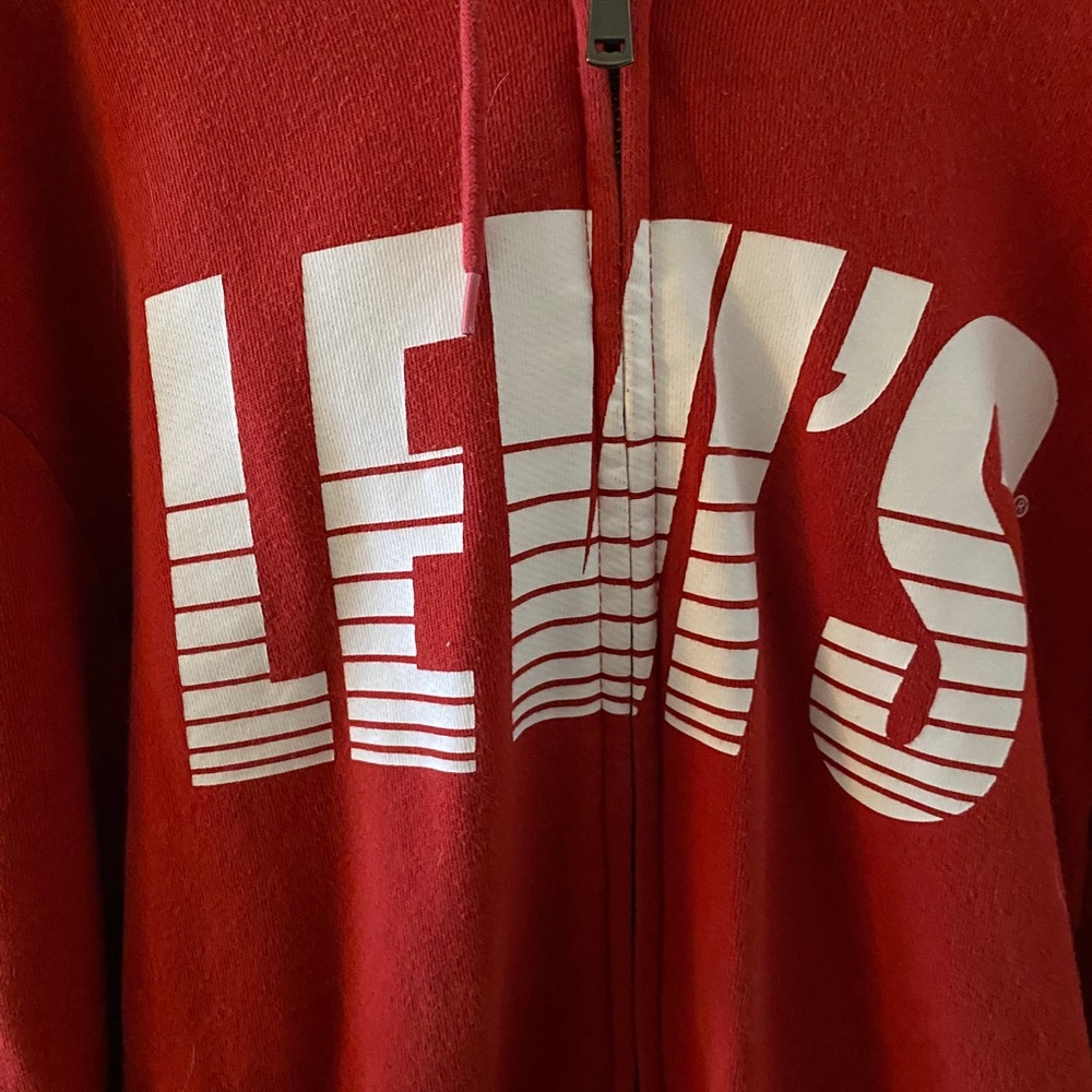 Red Levi’s hoodie. Adult extra large
